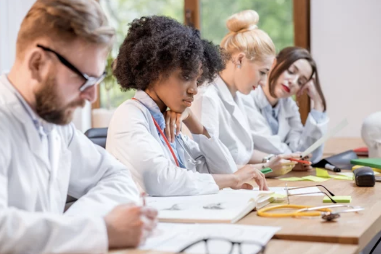 students in a medical class for phlebotomy training