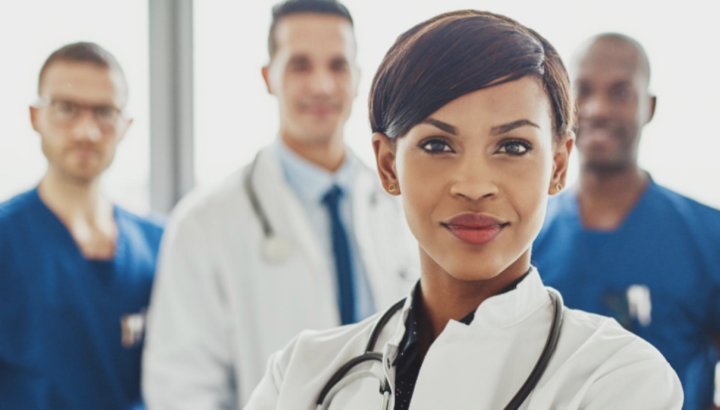 group of medical professionals standing for a careers picture