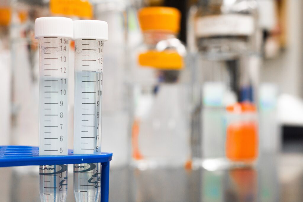 test tubes for drug screenings all sitting on a table in a medical lab office