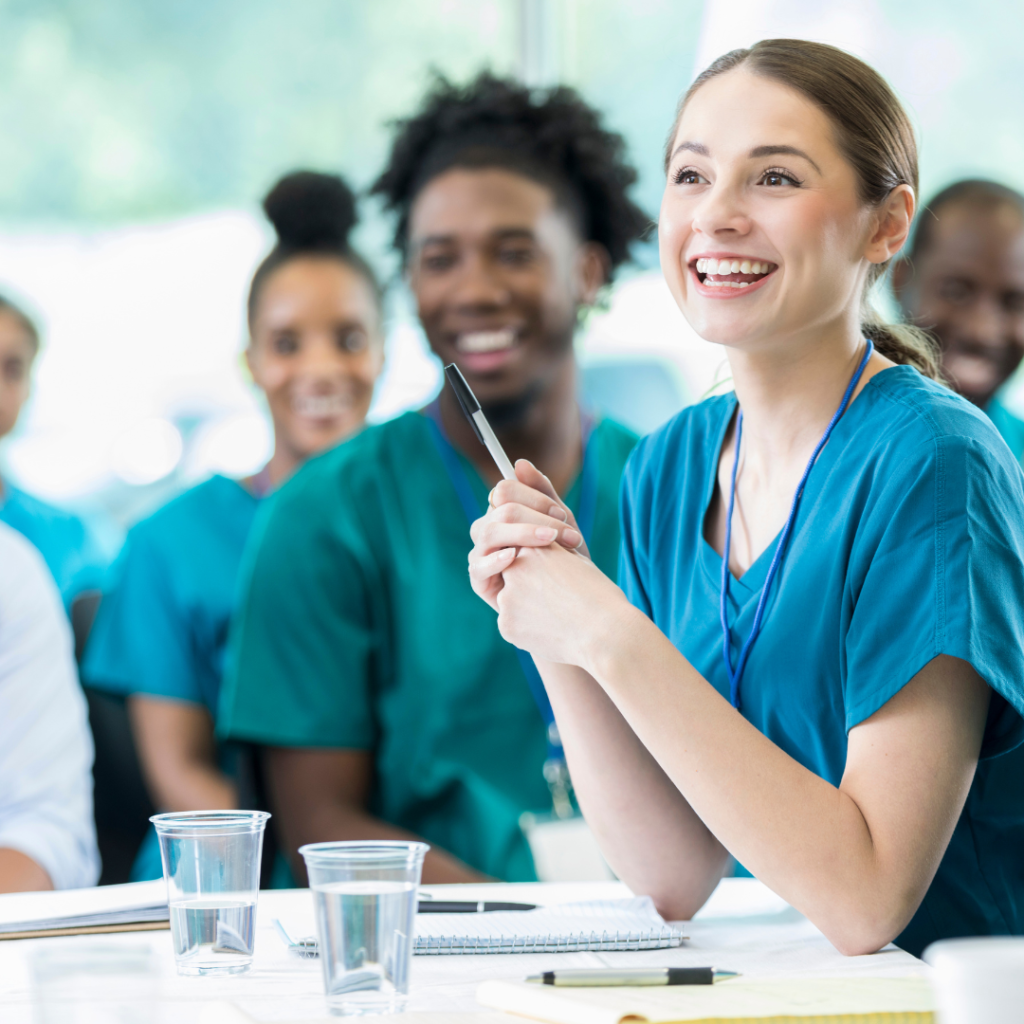 woman smiling in phlebotomy training class