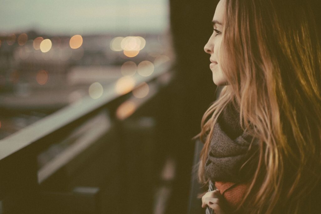 woman looking outside