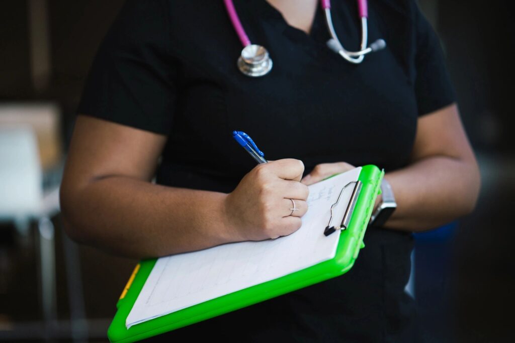 medical tech with clipboard